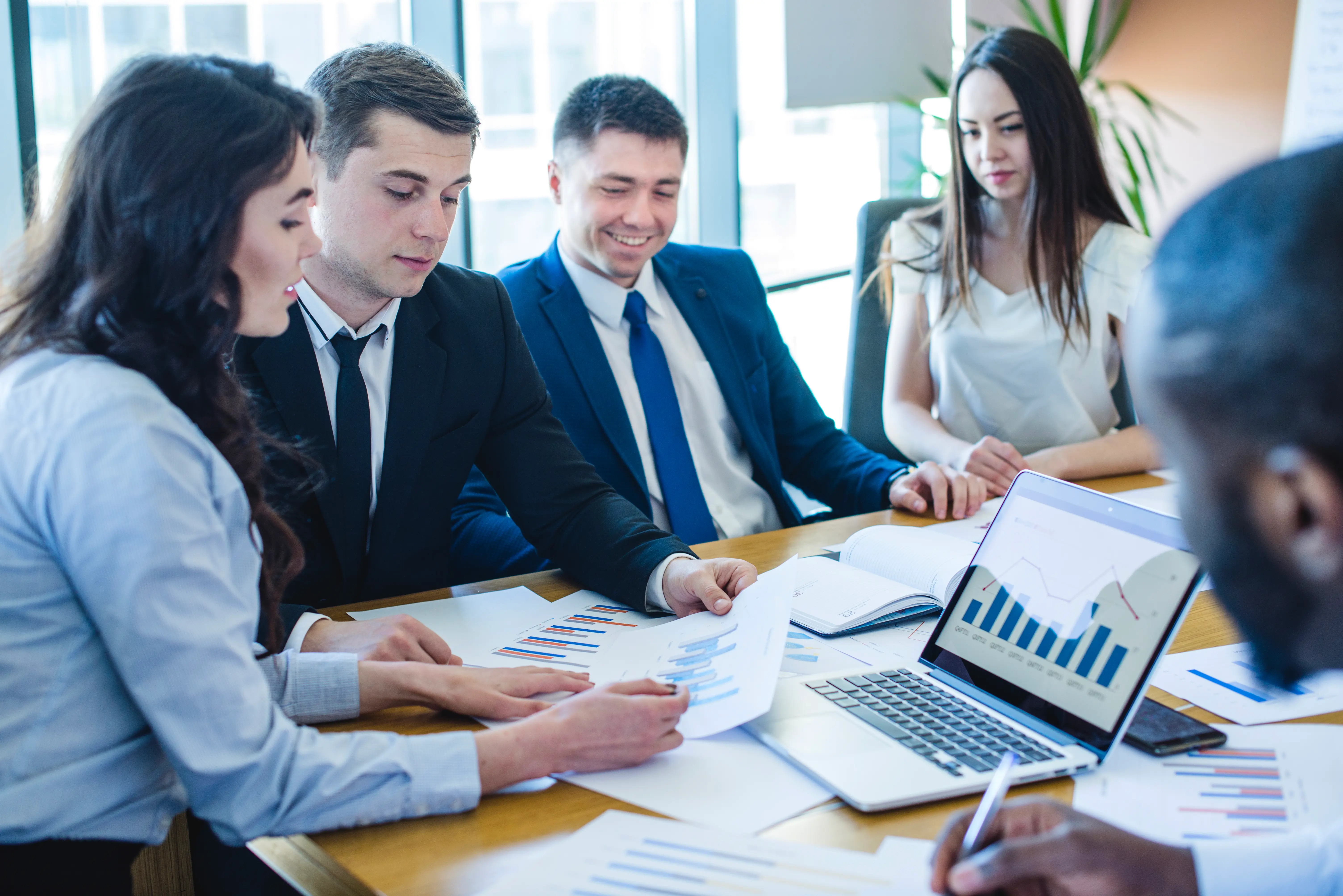 Codensys software development team collaborating on projects